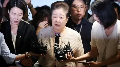 Disputed Religious Leader Rejects Gift-giving Claims Against Ex-South Korea President's Wife